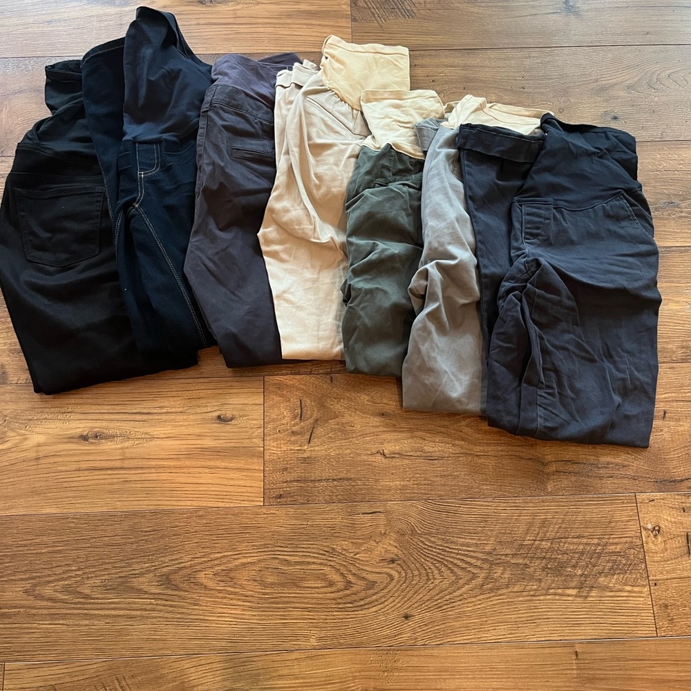 Maternity lot of 5 dress pants, 1 pair of blue jeans, 1 pair of black jeans.